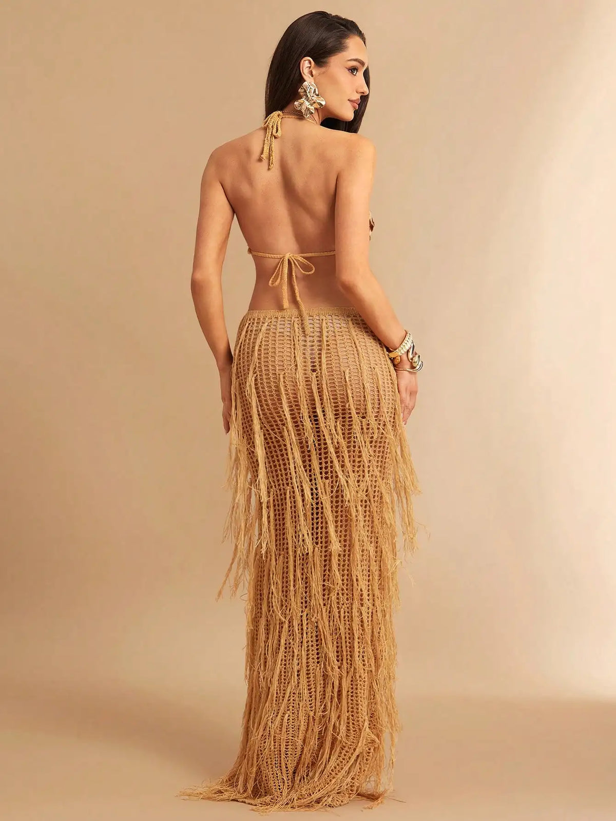 White Sheer Crochet Maxi Dress Featuring Halter Neckline, Deep Front Cutout, And Cascading Fringe Skirt For Summer Beach