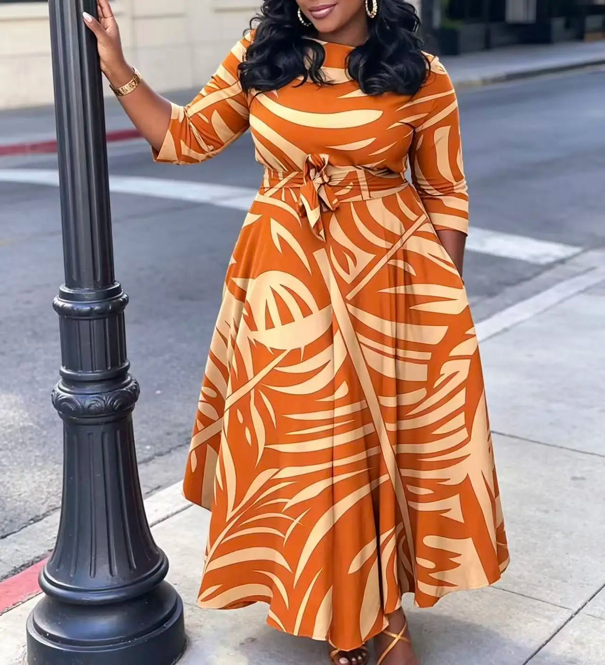 Plus size women's orange palm leaf print plus size midi dress round neck three-quarter sleeves waist tie cinched waist flared hem pockets vacation maxi